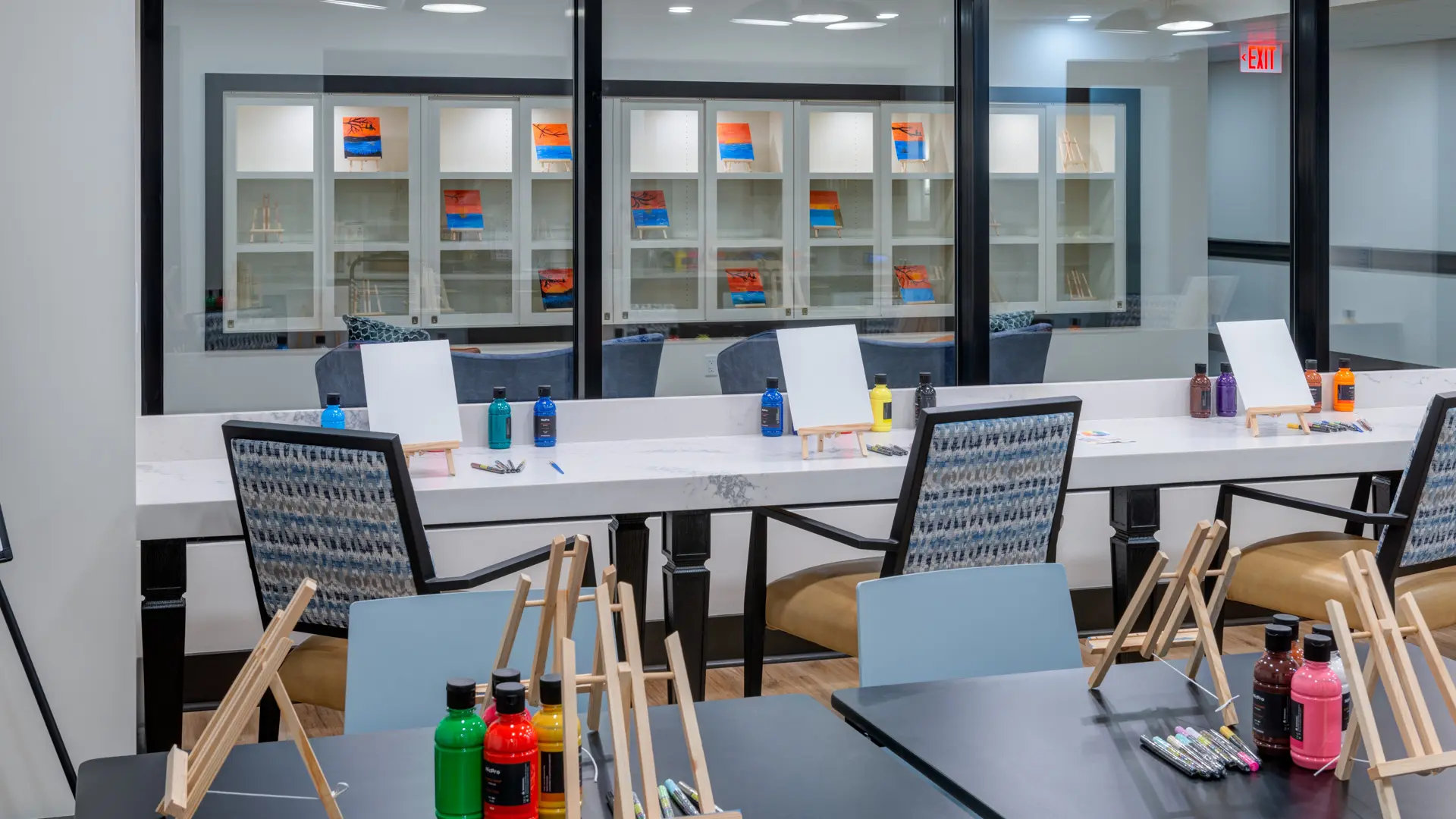 Activities room with paints and brushes at American House Oak Park, a luxury retirement home in Oak Park, Illinois